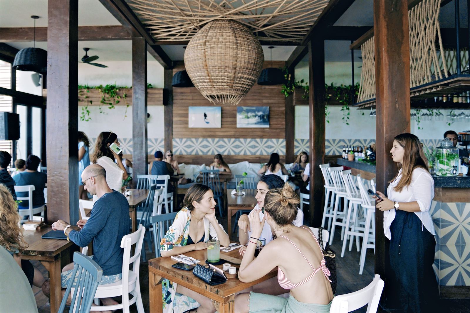 The Real Coconut dining room full at midday